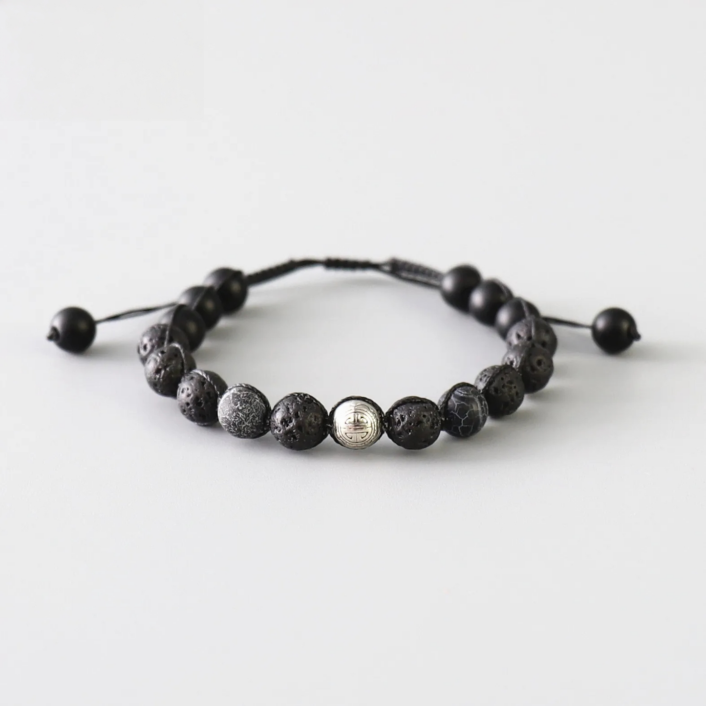 Handmade Tibetan Blessed Black Onyx for "Protection & Inner Strength" with Om Mani Padme Hum Charm